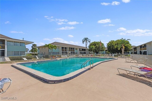 402 SE 42nd Ter Unit D-7, Cape Coral, FL 33904 - pool with fence and a patio