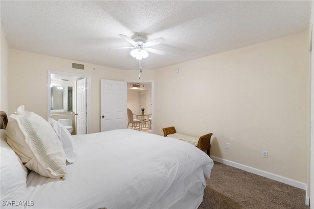 bedroom featuring carpet, visible vents, connected bathroom, a textured ceiling, and baseboards