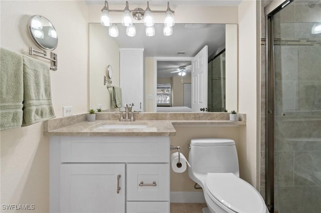 bathroom with visible vents, toilet, a stall shower, vanity, and tile patterned flooring