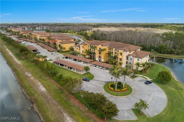 bird's eye view with a water view