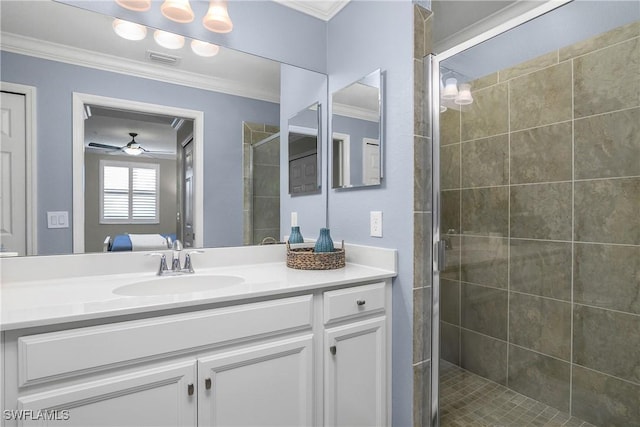 ensuite bathroom with ornamental molding, a stall shower, visible vents, and vanity