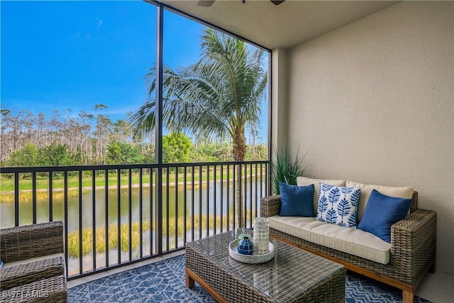 balcony featuring a ceiling fan