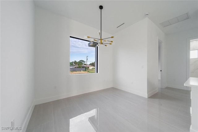 interior space featuring light tile patterned floors, plenty of natural light, a chandelier, and baseboards