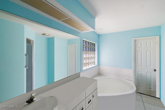 bathroom featuring a garden tub, tile patterned flooring, vanity, and a shower stall