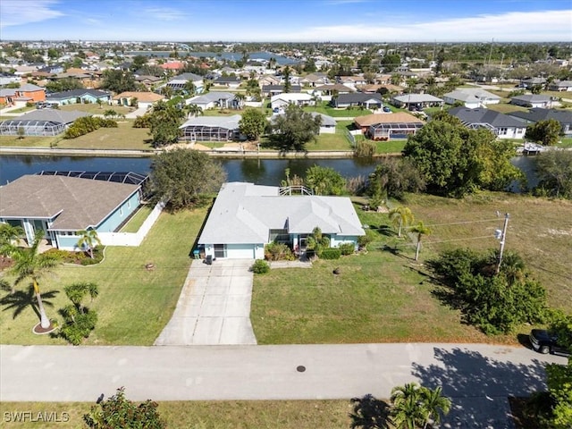 aerial view with a water view and a residential view