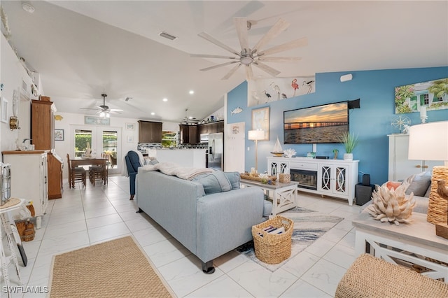 living room featuring a fireplace, lofted ceiling, recessed lighting, visible vents, and ceiling fan