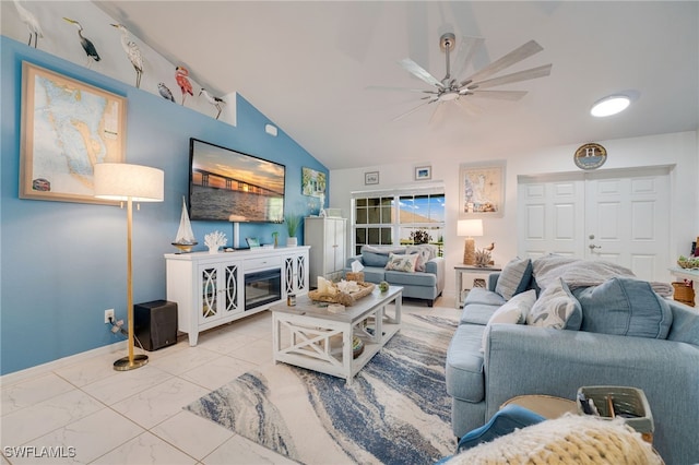 living area with marble finish floor, baseboards, vaulted ceiling, and a ceiling fan