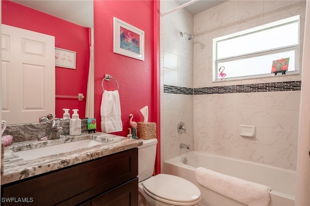 bathroom with shower / bathing tub combination, vanity, and toilet