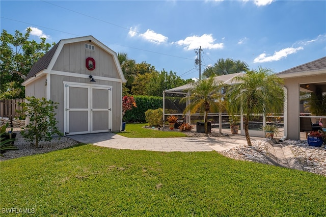 view of shed featuring fence