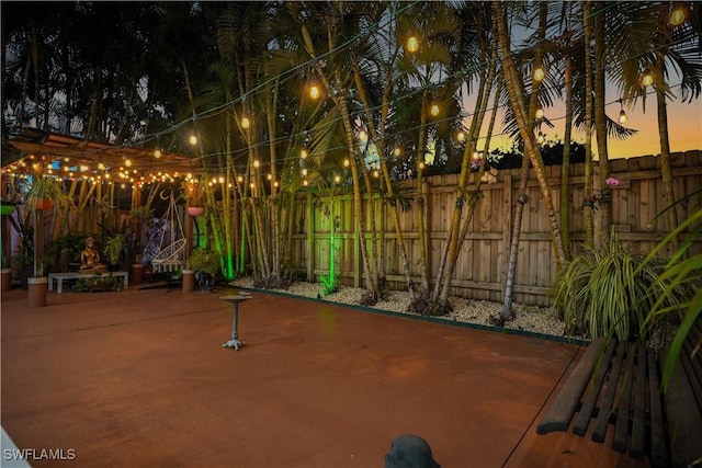 patio terrace at dusk with fence