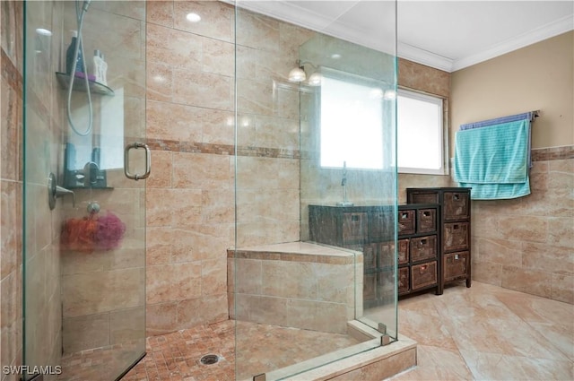 full bathroom with ornamental molding, a stall shower, and tile walls