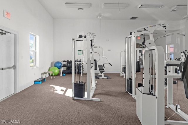 workout area featuring visible vents and baseboards