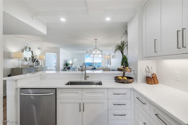 780 S Collier Blvd Unit 708, Marco Island, FL 34145 - kitchen with dishwasher, open floor plan, a sink, and light countertops