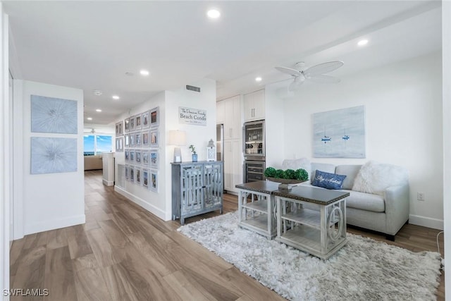 780 S Collier Blvd Unit 708, Marco Island, FL 34145 - living area with baseboards, wood finished floors, recessed lighting, and ceiling fan
