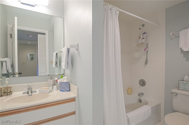 bathroom featuring visible vents, vanity, toilet, and shower / tub combo with curtain