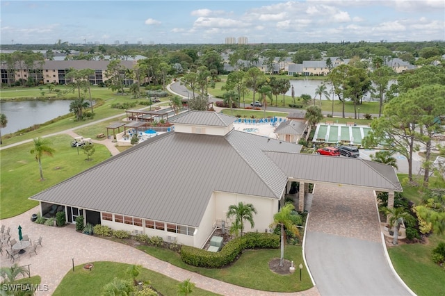 birds eye view of property featuring a water view