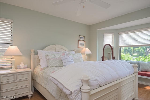 bedroom with ceiling fan and wood finished floors