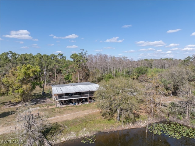 bird's eye view featuring a forest view