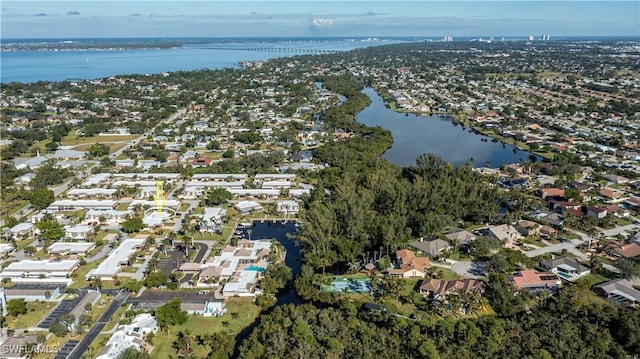 aerial view with a water view and a residential view