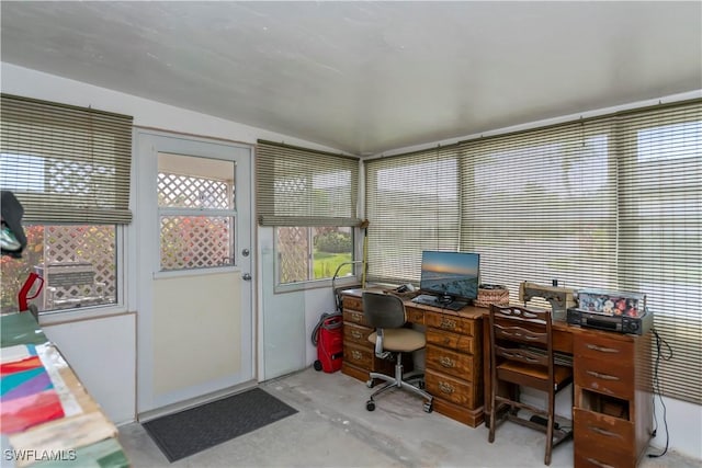 office with unfinished concrete floors