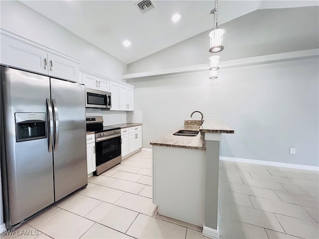 kitchen with stainless steel appliances, lofted ceiling, visible vents, white cabinetry, and a sink