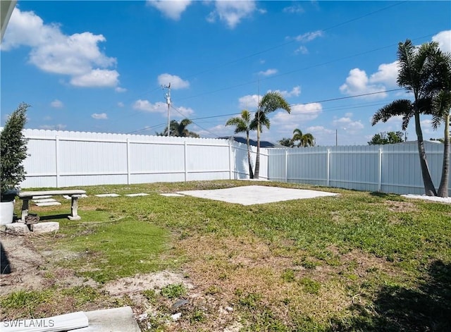 view of yard with a fenced backyard