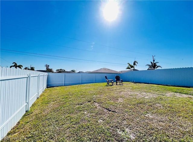 view of yard featuring a fenced backyard