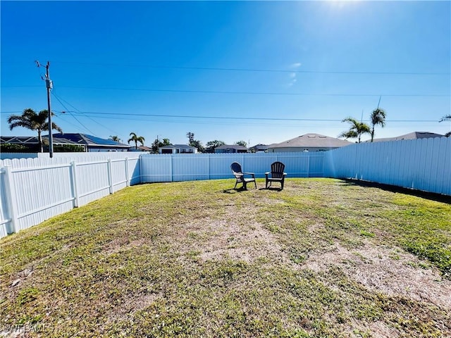 view of yard featuring a fenced backyard