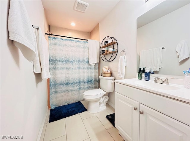 bathroom featuring visible vents, toilet, tile patterned floors, curtained shower, and vanity