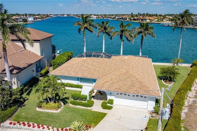 bird's eye view with a water view