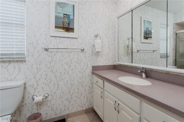 full bathroom featuring toilet, wallpapered walls, and tile patterned flooring