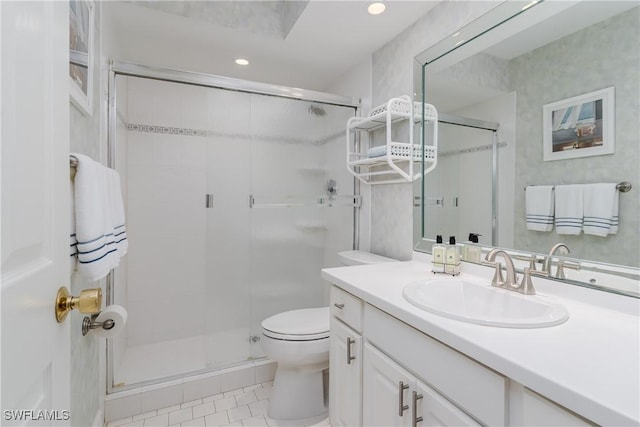 full bath featuring tile patterned flooring, toilet, recessed lighting, vanity, and a stall shower