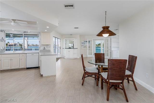 dining room featuring recessed lighting, visible vents, ceiling fan, light wood-type flooring, and baseboards