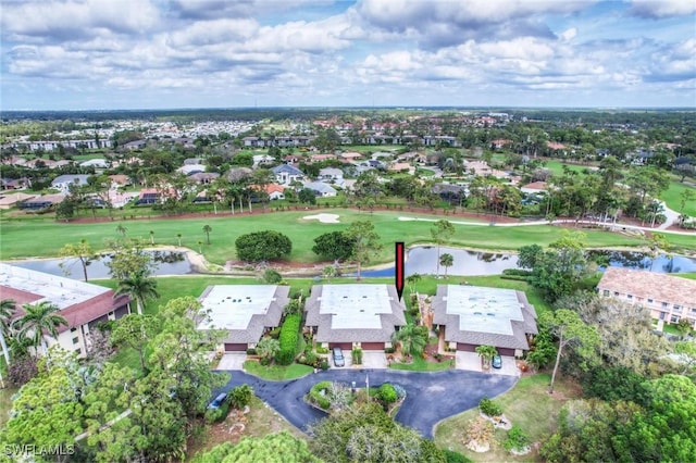 bird's eye view featuring a water view and a residential view