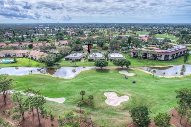 drone / aerial view featuring a water view and view of golf course