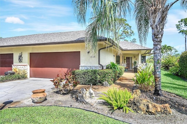 single story home featuring a garage, stone siding, and stucco siding