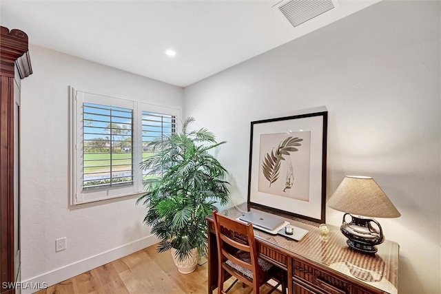 office featuring recessed lighting, wood finished floors, visible vents, and baseboards