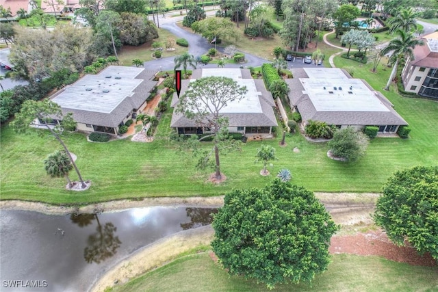 bird's eye view with a water view