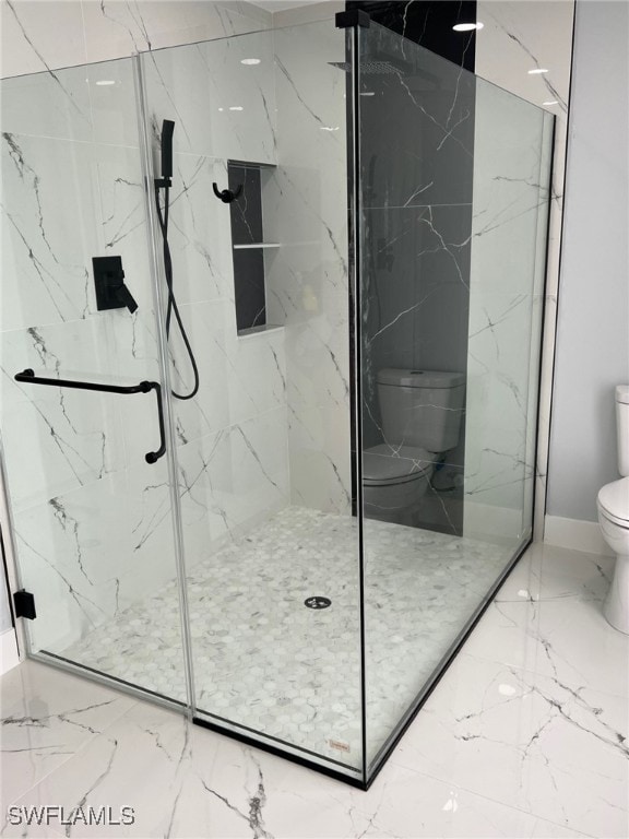 full bathroom with toilet, marble finish floor, and a marble finish shower