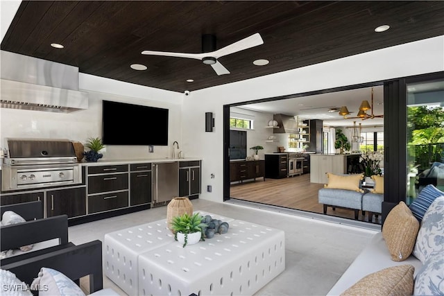 living area featuring ceiling fan, wooden ceiling, and recessed lighting