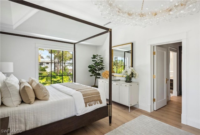 bedroom with light wood-type flooring