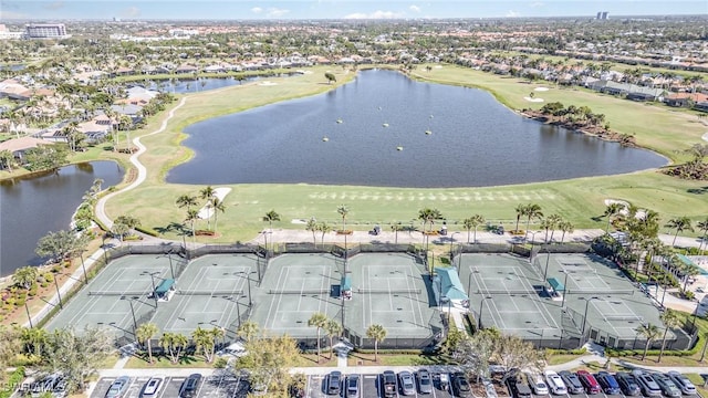 aerial view with a water view and golf course view