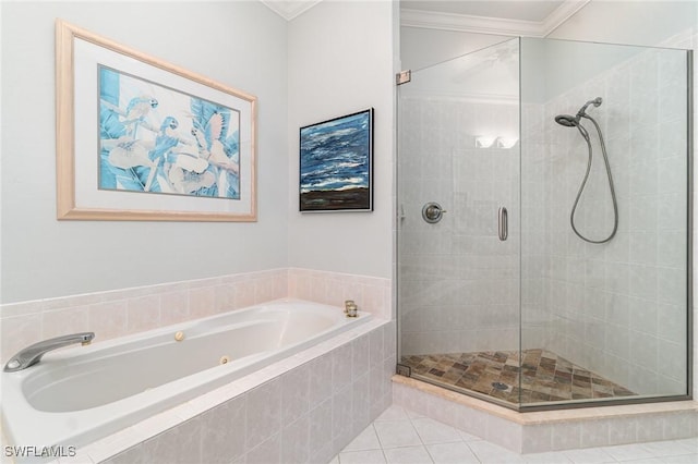 full bath featuring a whirlpool tub, a shower stall, crown molding, and tile patterned floors