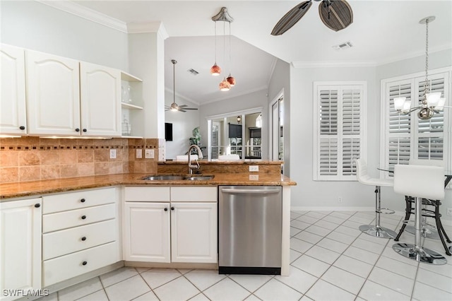 kitchen featuring ceiling fan with notable chandelier, a sink, visible vents, stainless steel dishwasher, and ornamental molding