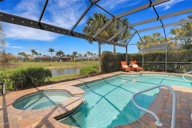 view of swimming pool featuring a patio area, a water view, a lanai, and a pool with connected hot tub