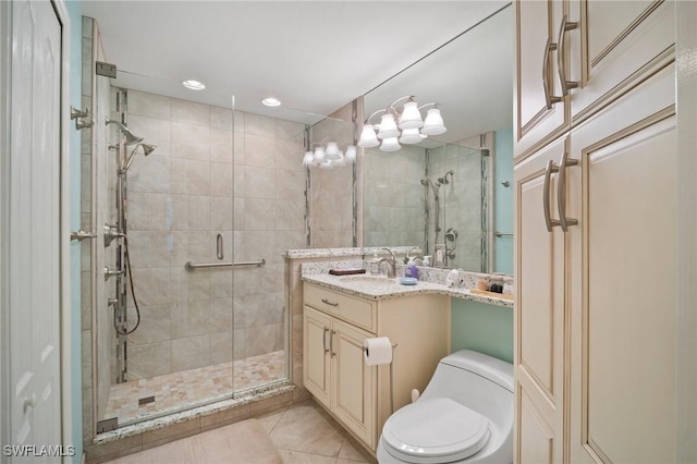 full bathroom with toilet, a shower stall, and vanity