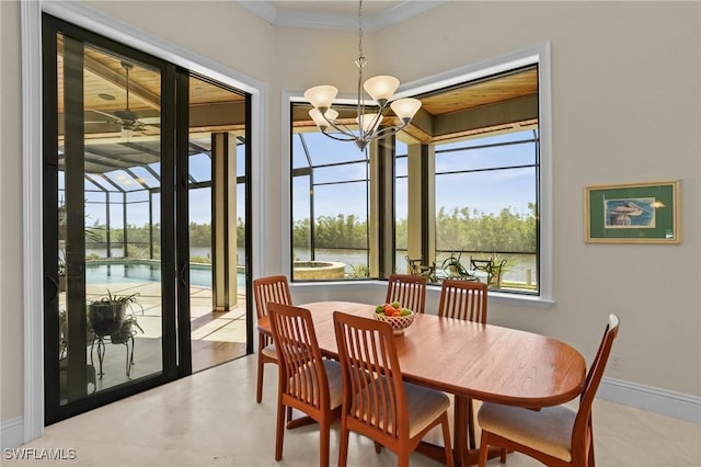 dining room featuring a chandelier, crown molding, baseboards, and a sunroom