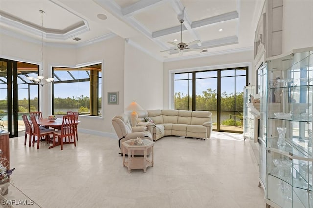 living room featuring beam ceiling, coffered ceiling, a towering ceiling, and crown molding