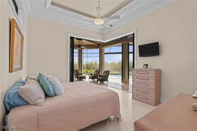 bedroom featuring a ceiling fan, access to outside, crown molding, a sunroom, and a raised ceiling