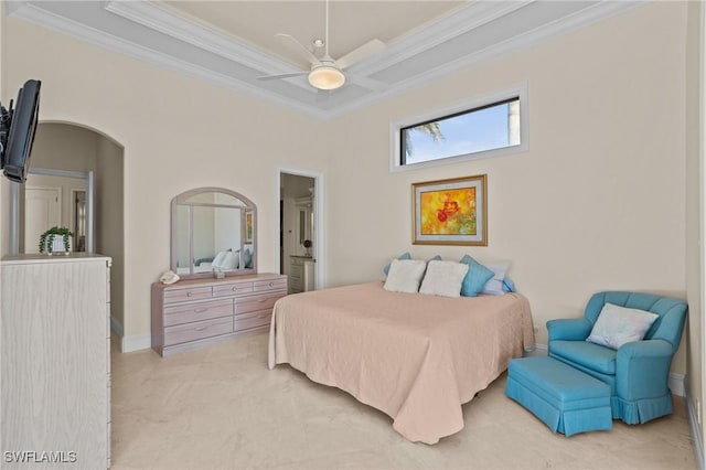 bedroom with baseboards, arched walkways, ornamental molding, and a ceiling fan